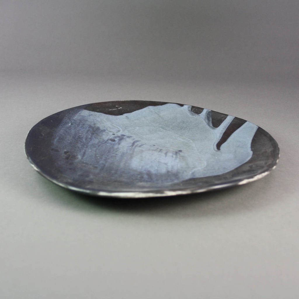 Heather Waugh Pitts artwork 'Black Porcelain Plate with Dark Blue Glaze I' at Gallery78 Fredericton, New Brunswick