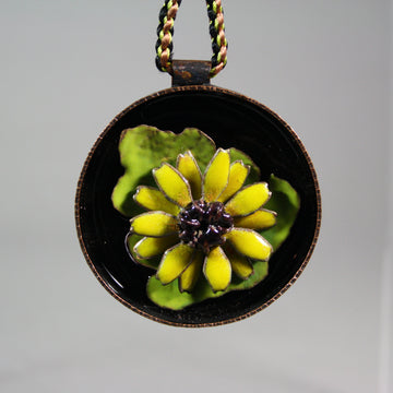 Ann Fillmore artwork 'Enamelled Flower Ornament: Yellow Flower (2.5 in. diameter)' at Gallery78 Fredericton, New Brunswick