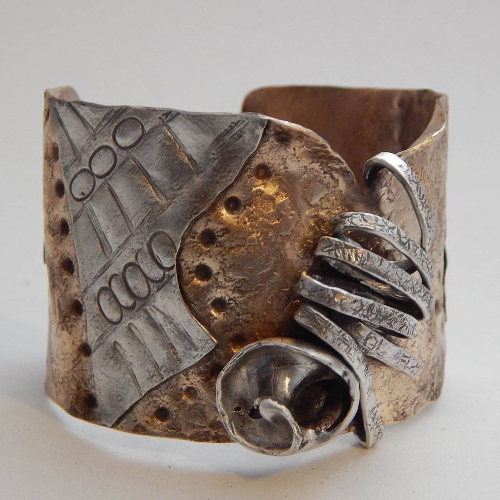 Clare Bridge artwork 'Cuff with Spiral and Snail Shard' at Gallery78 Fredericton, New Brunswick