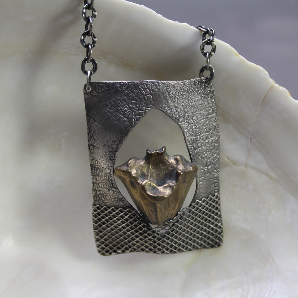 Clare Bridge artwork 'Pendant with Pod' at Gallery78 Fredericton, New Brunswick