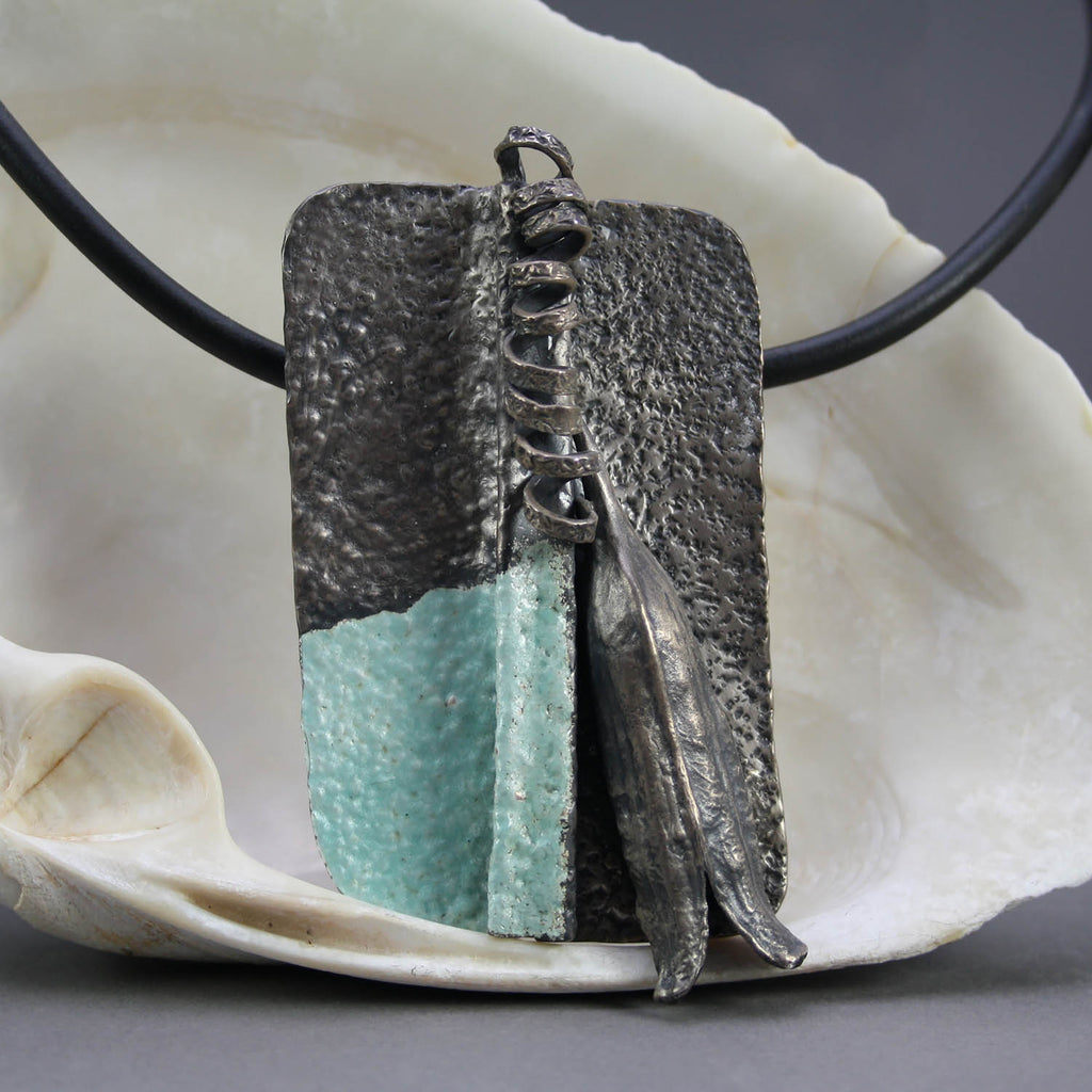 Clare Bridge artwork 'Pendant with Pod and Enamel' at Gallery78 Fredericton, New Brunswick
