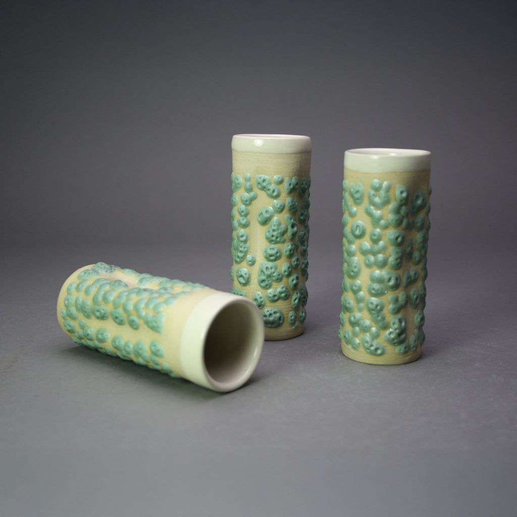 Matthew Cripps artwork 'Bud Vase: Green Crawl, White Clay' at Gallery78 Fredericton, New Brunswick