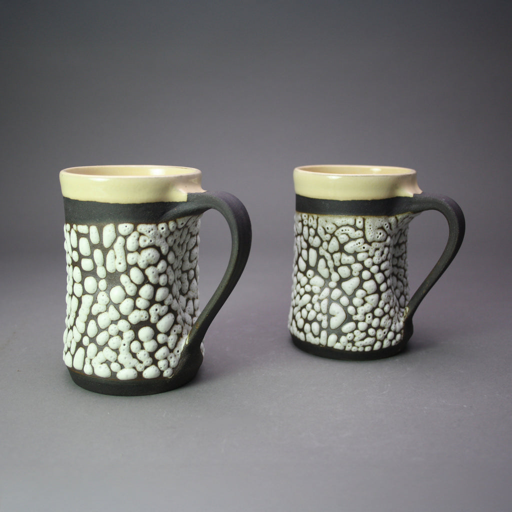 Matthew Cripps artwork 'Mug: White Crawl, Black Clay' at Gallery78 Fredericton, New Brunswick