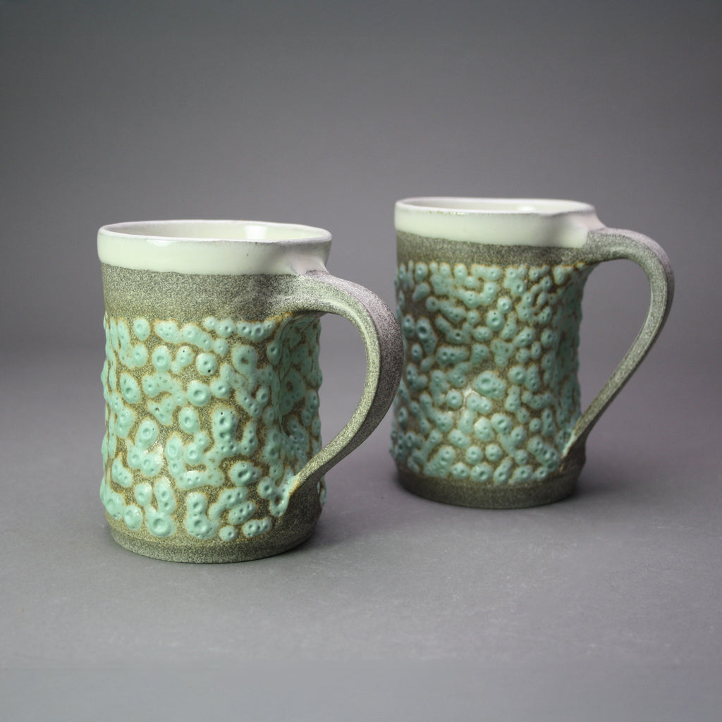 Matthew Cripps artwork 'Mug: Green Crawl, Granite Clay' at Gallery78 Fredericton, New Brunswick