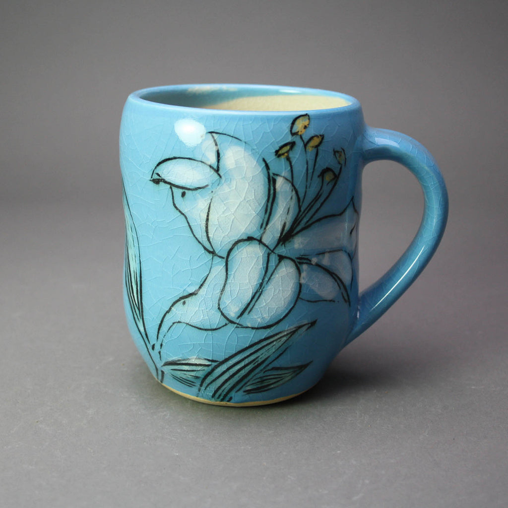 Karen Burk artwork 'Mug - Blue with Lily 1' at Gallery78 Fredericton, New Brunswick