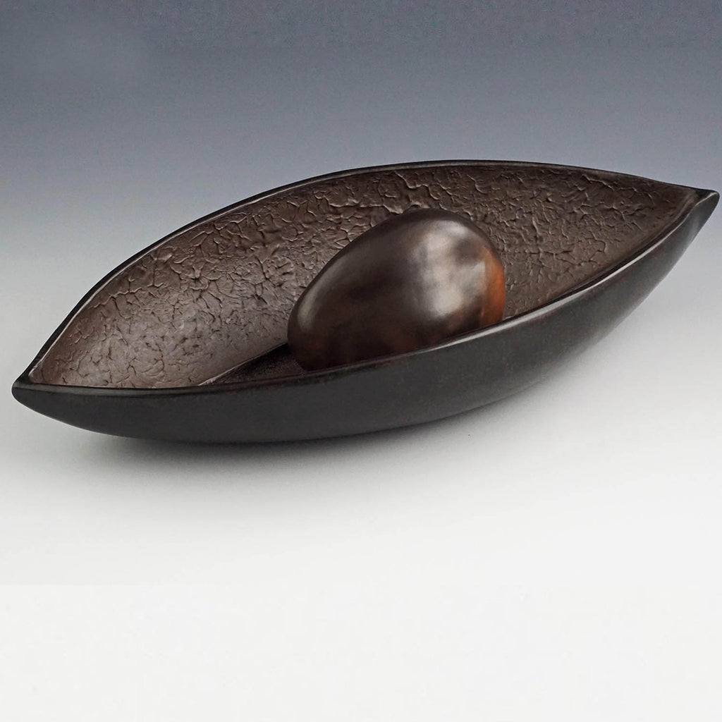 Judy Blake artwork 'Smoke-Fired Seed Vessel 1' at Gallery78 Fredericton, New Brunswick