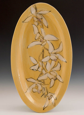Karen Burk artwork 'Wide Oval Platter, Yellow Orchid' at Gallery78 Fredericton, New Brunswick