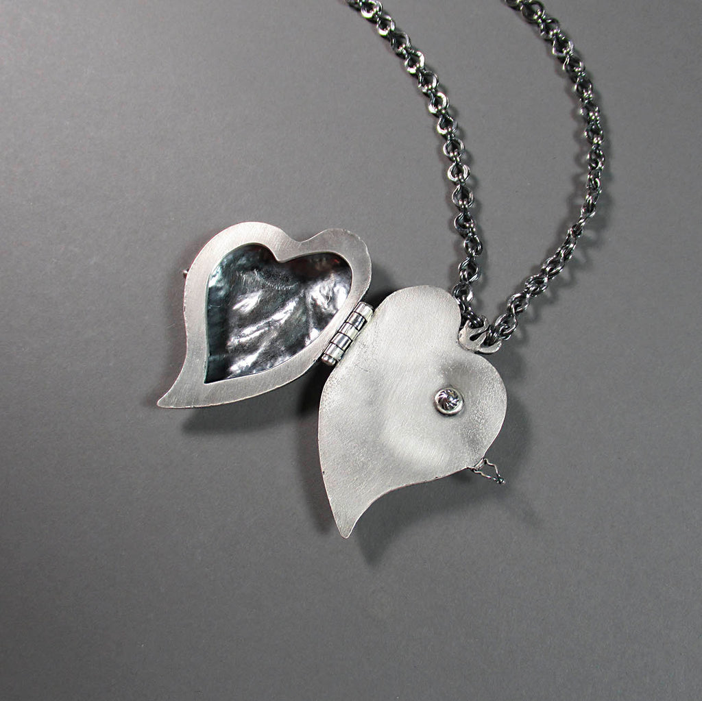 Ann Fillmore artwork 'Locket Necklace (ID #6)' at Gallery78 Fredericton, New Brunswick