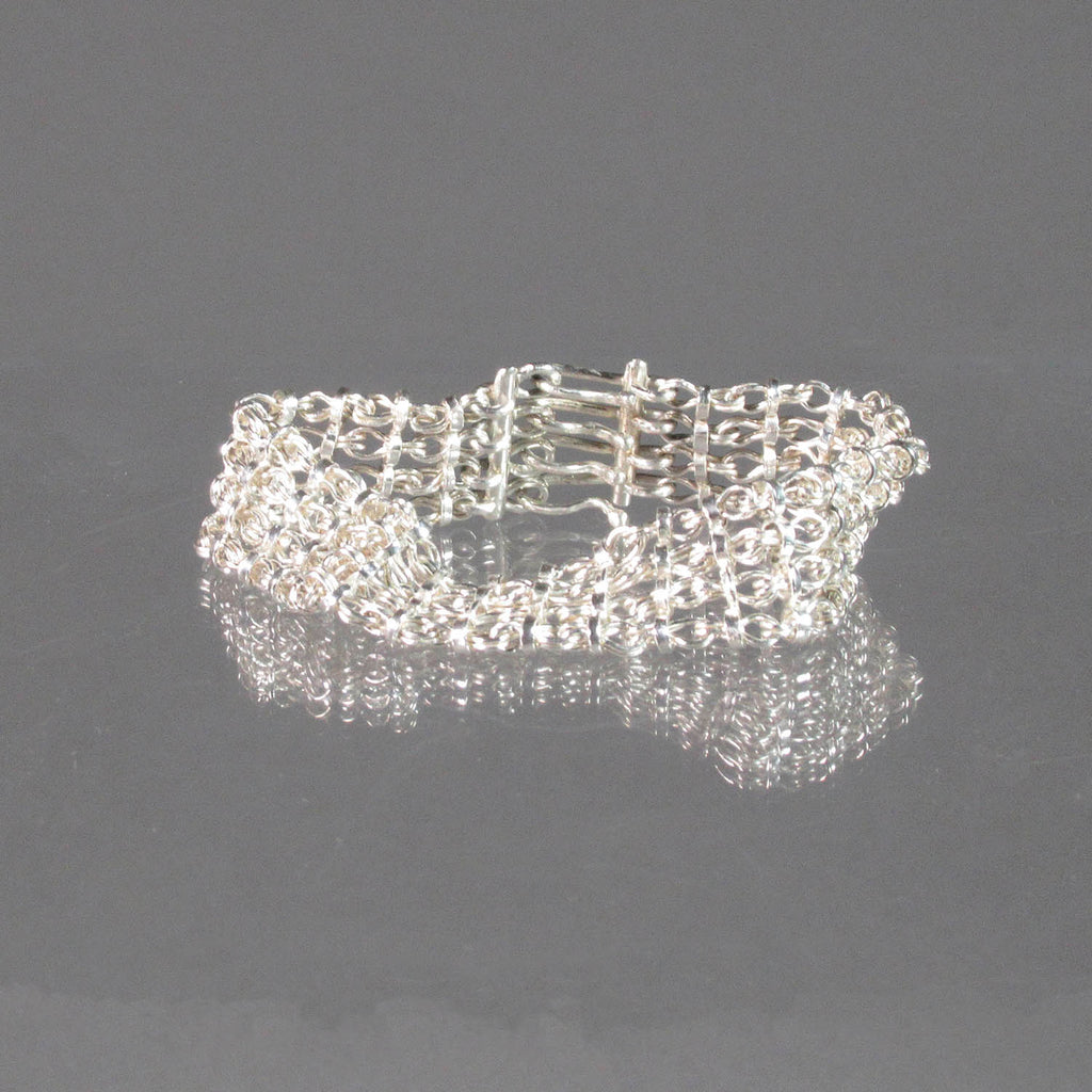 Ann Fillmore artwork 'Flat Woven Fine Silver Bracelet (Pinched)' at Gallery78 Fredericton, New Brunswick